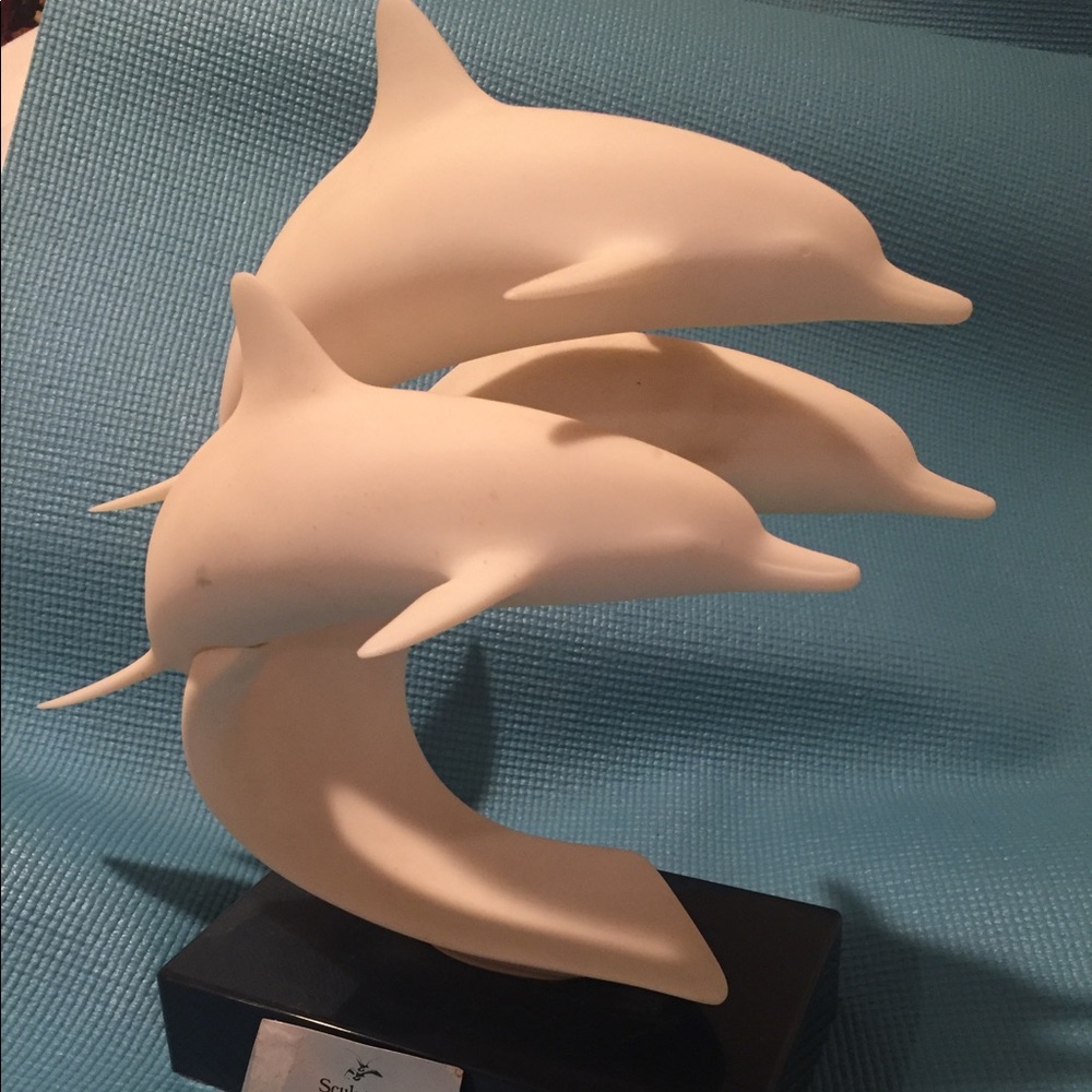 Dolphin sculpture by artist John Perry
